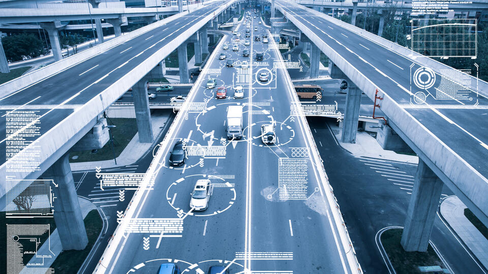 A photo illustration showing highways overlaid with electronic readouts